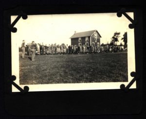 Scouts Salute In Front of Camp Russell Headquarters
