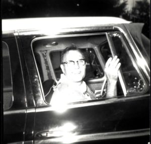 Scout Leader Waves From Car