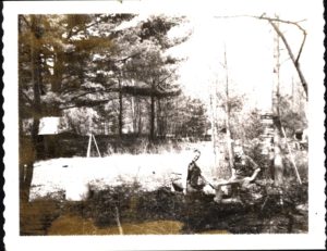 Scout Leaders Cutting Wood