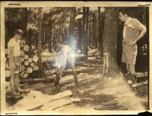 Scouts Cut Firewood Under Leader Supervision