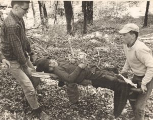 Scouts Practice Carrying Victim on Handmade Stretcher