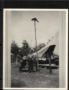 Scouts Pose Outside Tent at Camp Russell