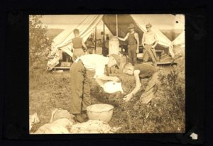 Scouts Wash Their Hands Outside Tent