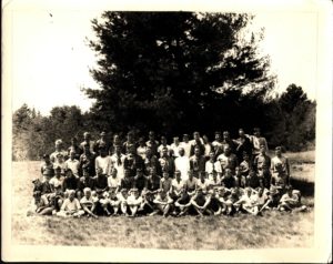 Camp Russell Staff & Scouts Pose Under Tree