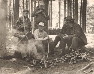 Scouts & Leaders Sit Around Fire