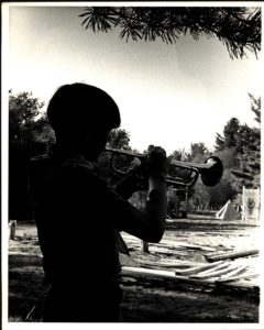 Camp Russell Scout Plays Trumpet